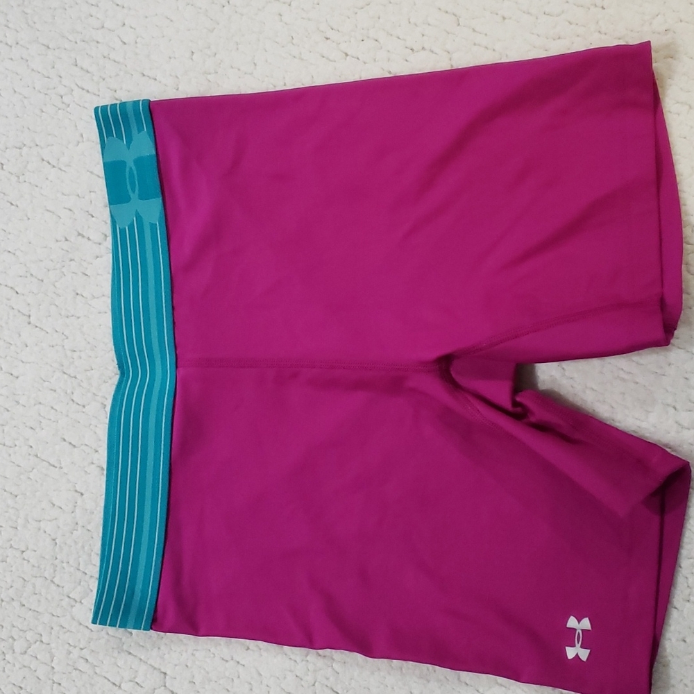 Under Armour magenta 4" compression shorts. Medium.
